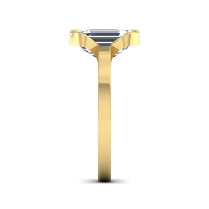 Emerald cut lab grown diamond half bezel solitaire engagement ring in yellow gold setting
