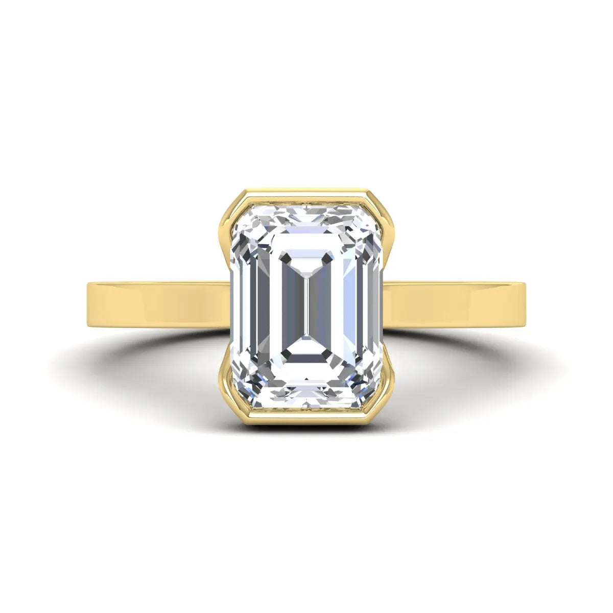 Emerald cut lab grown diamond half bezel solitaire engagement ring in yellow gold setting