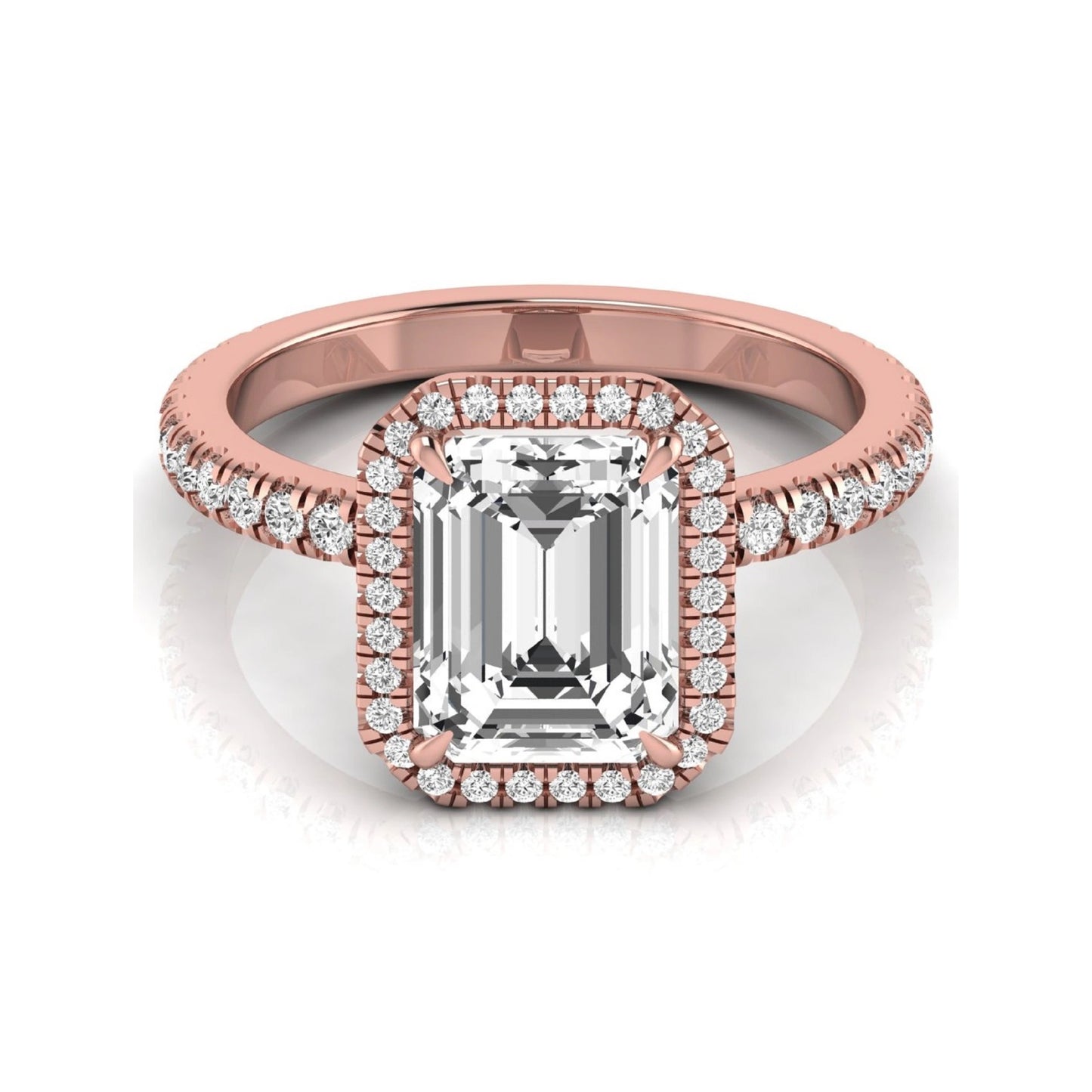 Emerald cut lab grown diamond engagement ring featuring a round diamond halo, pavé accent band, and four-prong setting with a polished rose gold tone band.