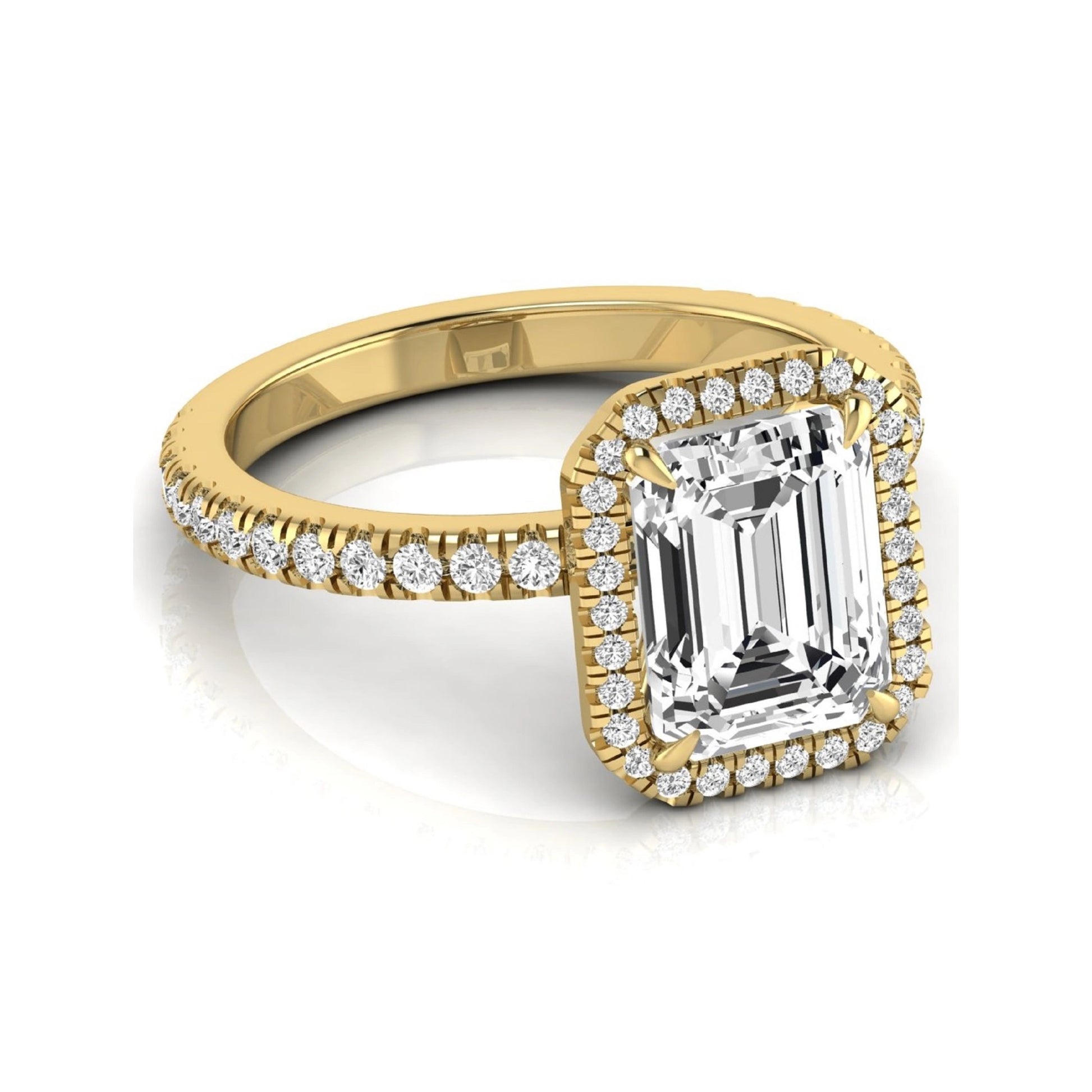 Emerald cut lab grown diamond engagement ring featuring a round diamond halo, pavé accent band, and four-prong setting with a polished yellow gold tone band.