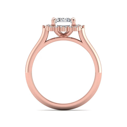 Emerald cut lab grown diamond halo engagement ring with round accent diamonds in a rose gold tone four-prong setting.