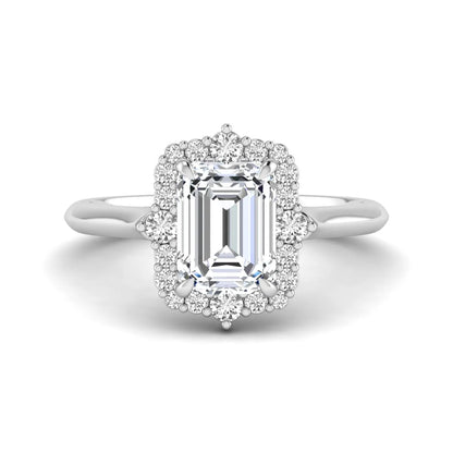 Emerald cut lab grown diamond halo engagement ring with round accent diamonds in a white gold tone four-prong setting.