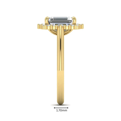 Emerald cut lab grown diamond halo engagement ring with round accent diamonds in a yellow gold tone four-prong setting.