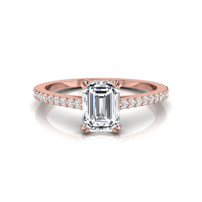 Emerald cut lab grown diamond engagement ring with hidden halo, pavé band, and four-prong setting in rose gold tone design