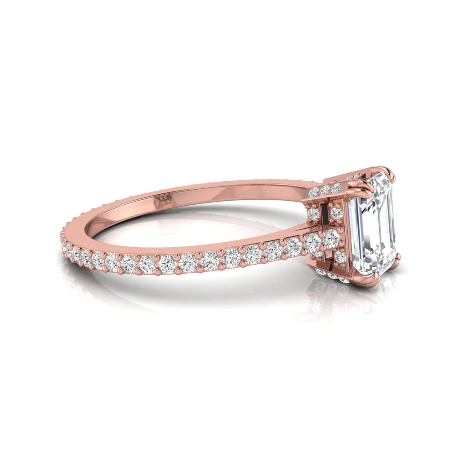 Emerald cut lab grown diamond engagement ring with hidden halo, pavé band, and four-prong setting in rose gold tone design