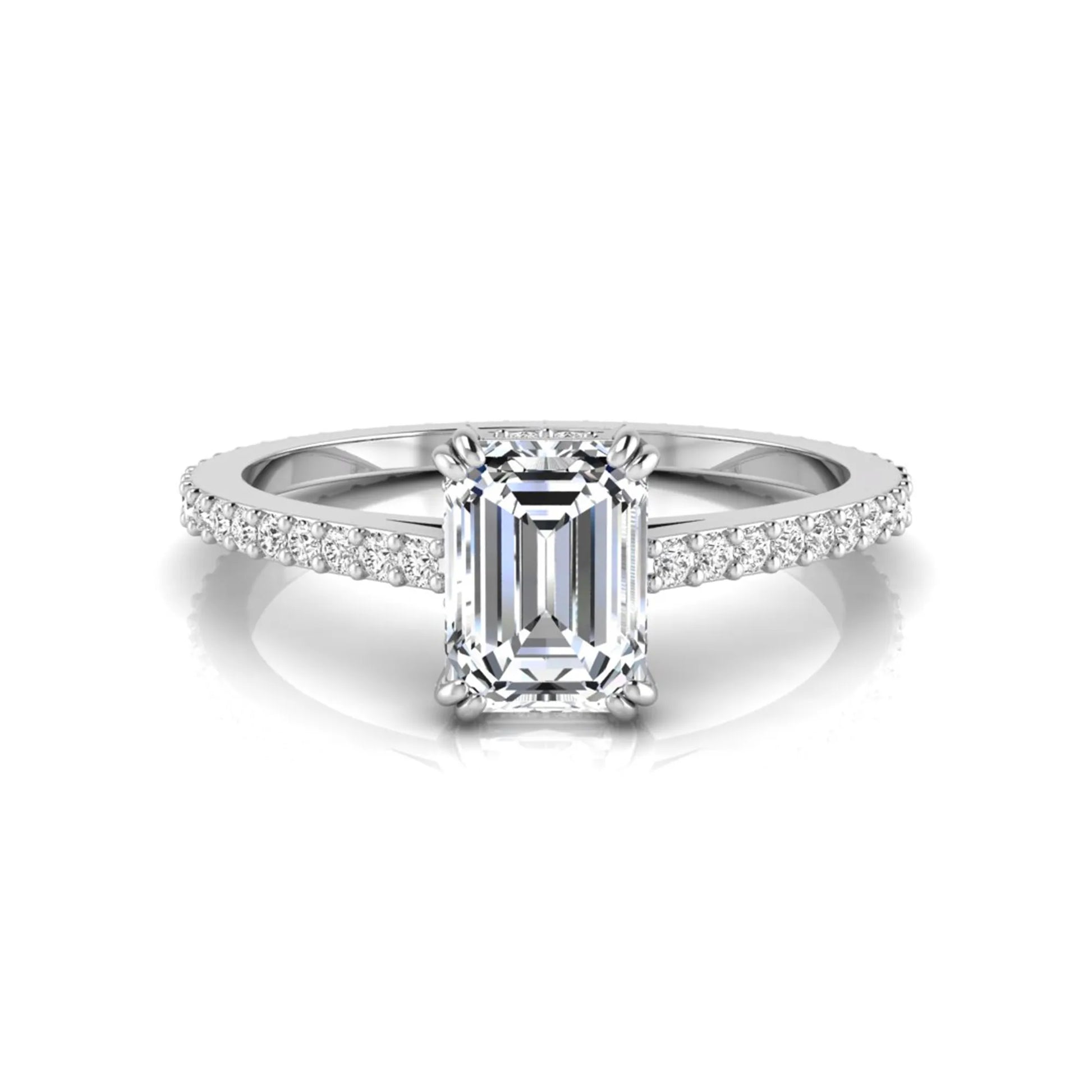 Emerald cut lab grown diamond engagement ring with hidden halo, pavé band, and four-prong setting in white gold tone design