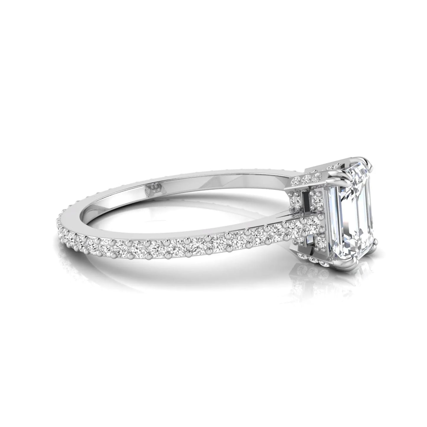 Emerald cut lab grown diamond engagement ring with hidden halo, pavé band, and four-prong setting in white gold tone design