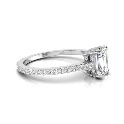 Emerald cut lab grown diamond engagement ring with hidden halo, pavé band, and four-prong setting in white gold tone design