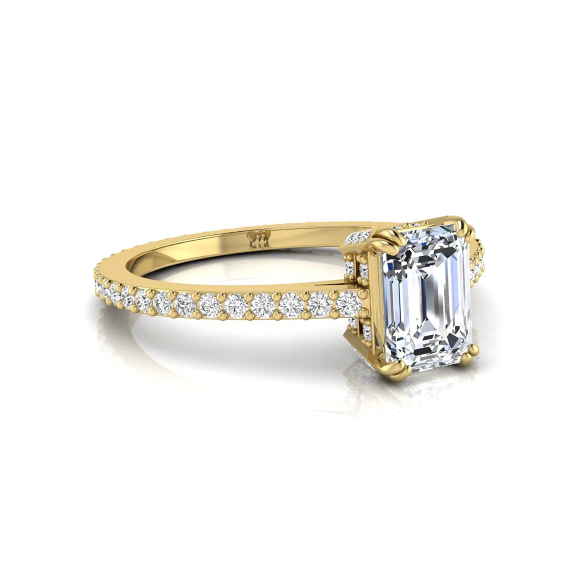 Emerald cut lab grown diamond engagement ring with hidden halo, pavé band, and four-prong setting in yellow gold tone design