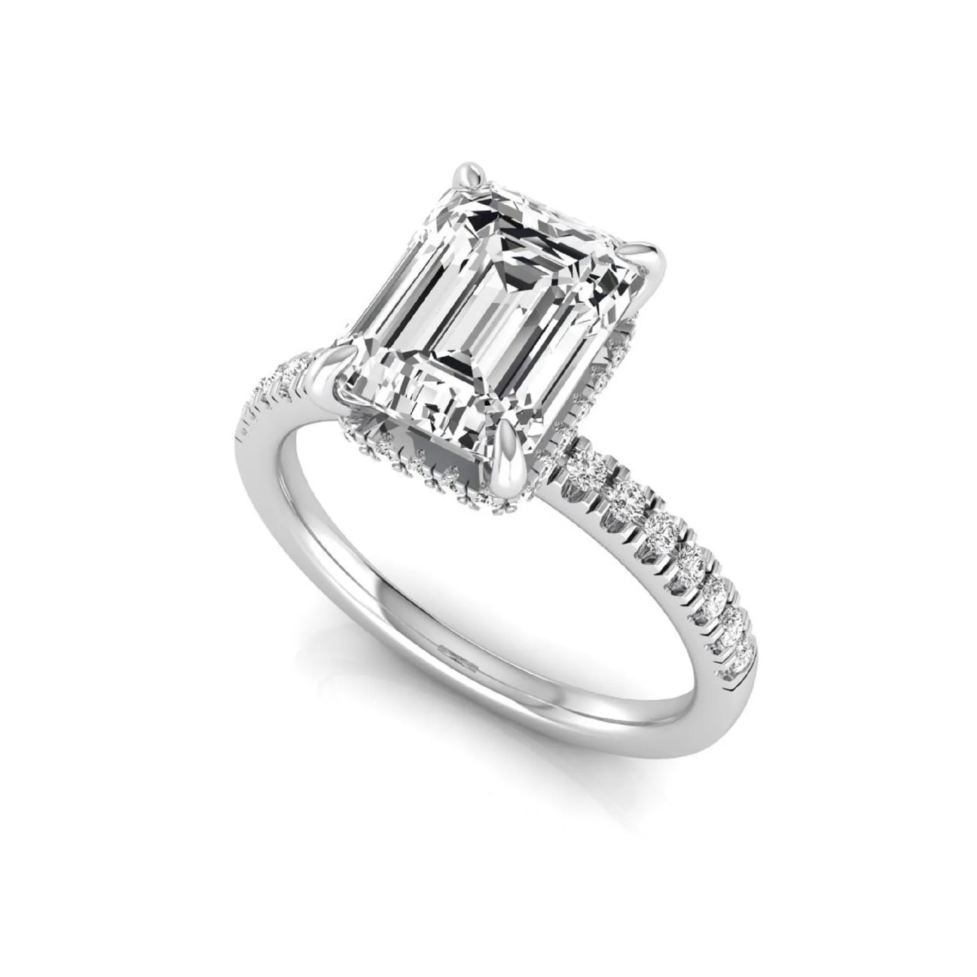 Emerald cut lab grown diamond engagement ring featuring a hidden halo, pavé diamond band, and four-prong setting in white gold tone.