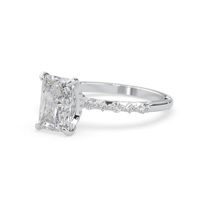 Emerald cut lab grown diamond engagement ring with pavé princess and round diamond accents in white gold