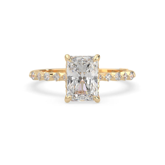 Emerald cut lab grown diamond engagement ring with pavé princess and round diamond accents in yellow gold