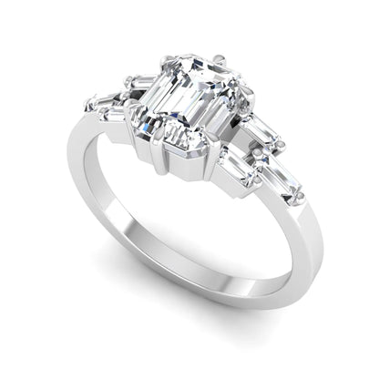 Emerald cut lab grown diamond engagement ring featuring an IGI certified center diamond with three-row baguette diamond shoulders in white gold.