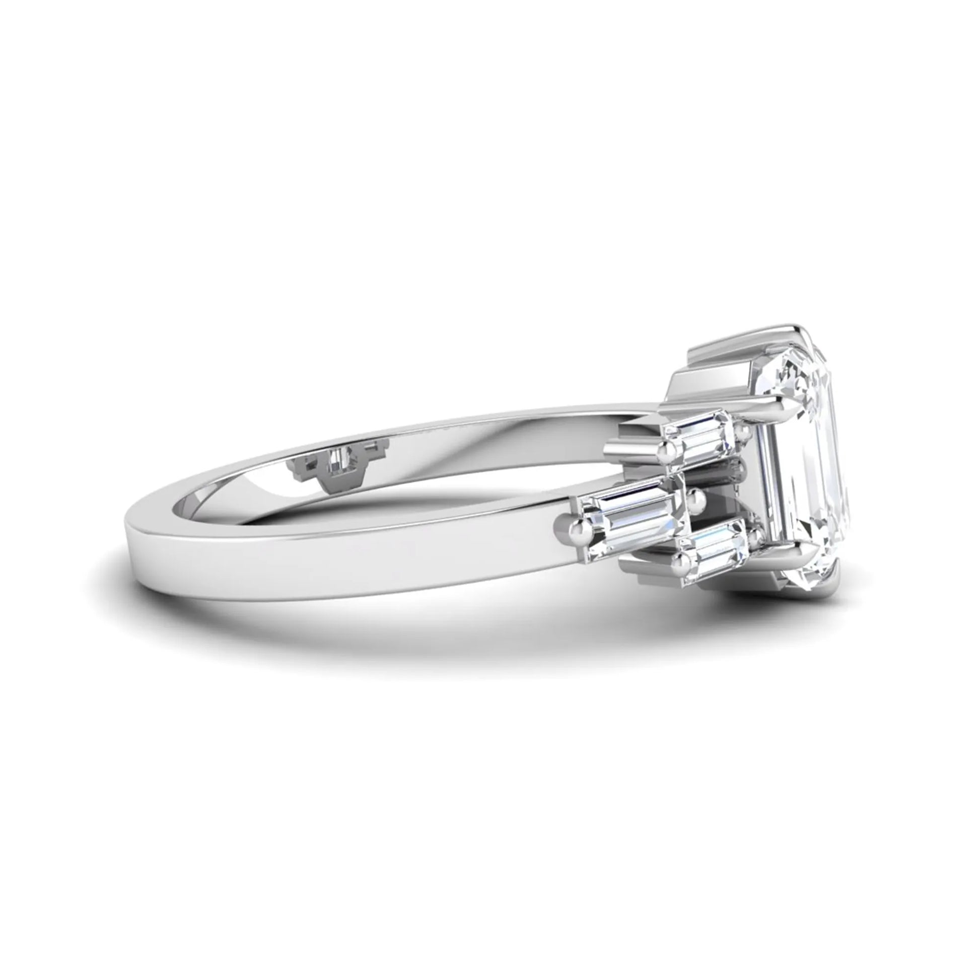 Emerald cut lab grown diamond engagement ring featuring an IGI certified center diamond with three-row baguette diamond shoulders in white gold.