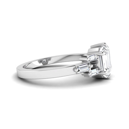 Emerald cut lab grown diamond engagement ring featuring an IGI certified center diamond with three-row baguette diamond shoulders in white gold.