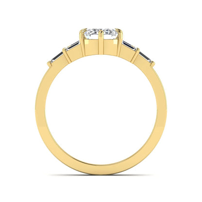 Emerald cut lab grown diamond engagement ring featuring an IGI certified center diamond with three-row baguette diamond shoulders in yellow gold.