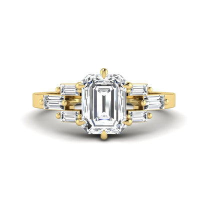 Emerald cut lab grown diamond engagement ring featuring an IGI certified center diamond with three-row baguette diamond shoulders in yellow gold.