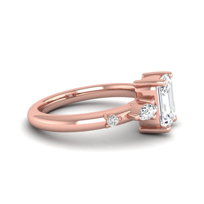 Emerald Marquise & Round Three Stone Lab Grown Diamond Engagement Ring featuring a 7.00 × 5.00 mm emerald-cut center diamond with marquise and round side diamonds in rose gold.