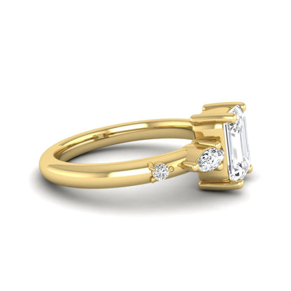 Emerald Marquise & Round Three Stone Lab Grown Diamond Engagement Ring featuring a 7.00 × 5.00 mm emerald-cut center diamond with marquise and round side diamonds in yellow gold.