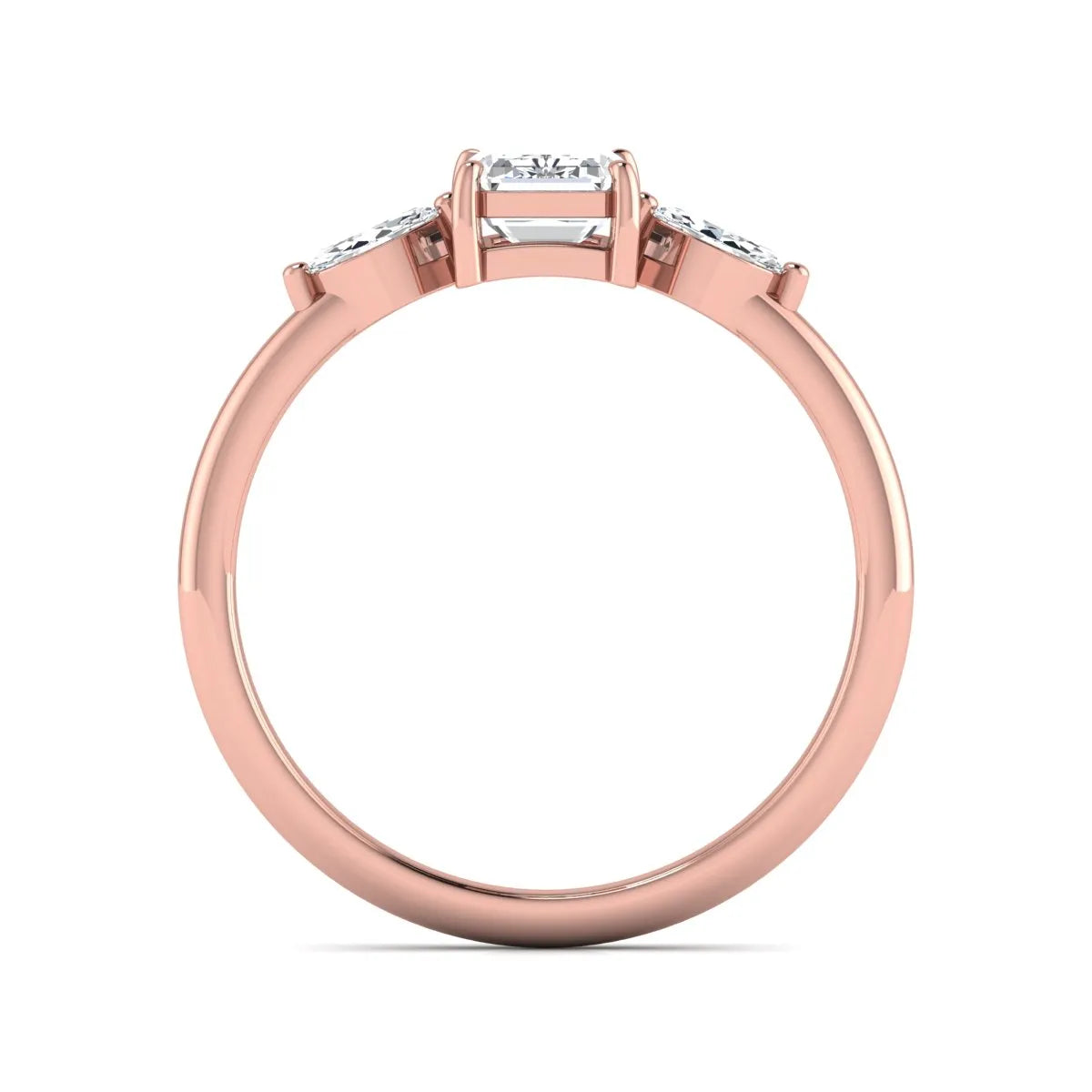 Emerald cut three stone lab grown diamond engagement ring featuring a 1.06 carat IGI certified center diamond with marquise side diamonds in rose gold.