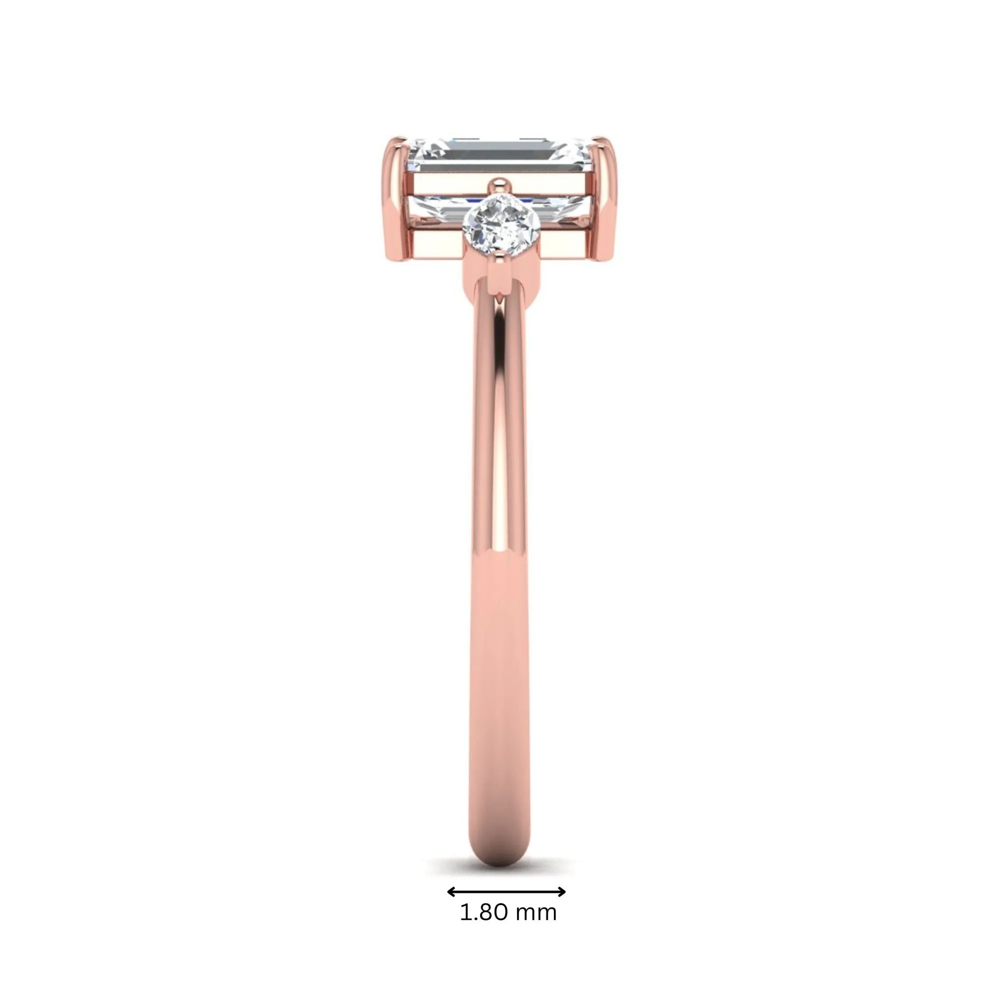 Emerald cut three stone lab grown diamond engagement ring featuring a 1.06 carat IGI certified center diamond with marquise side diamonds in rose gold.