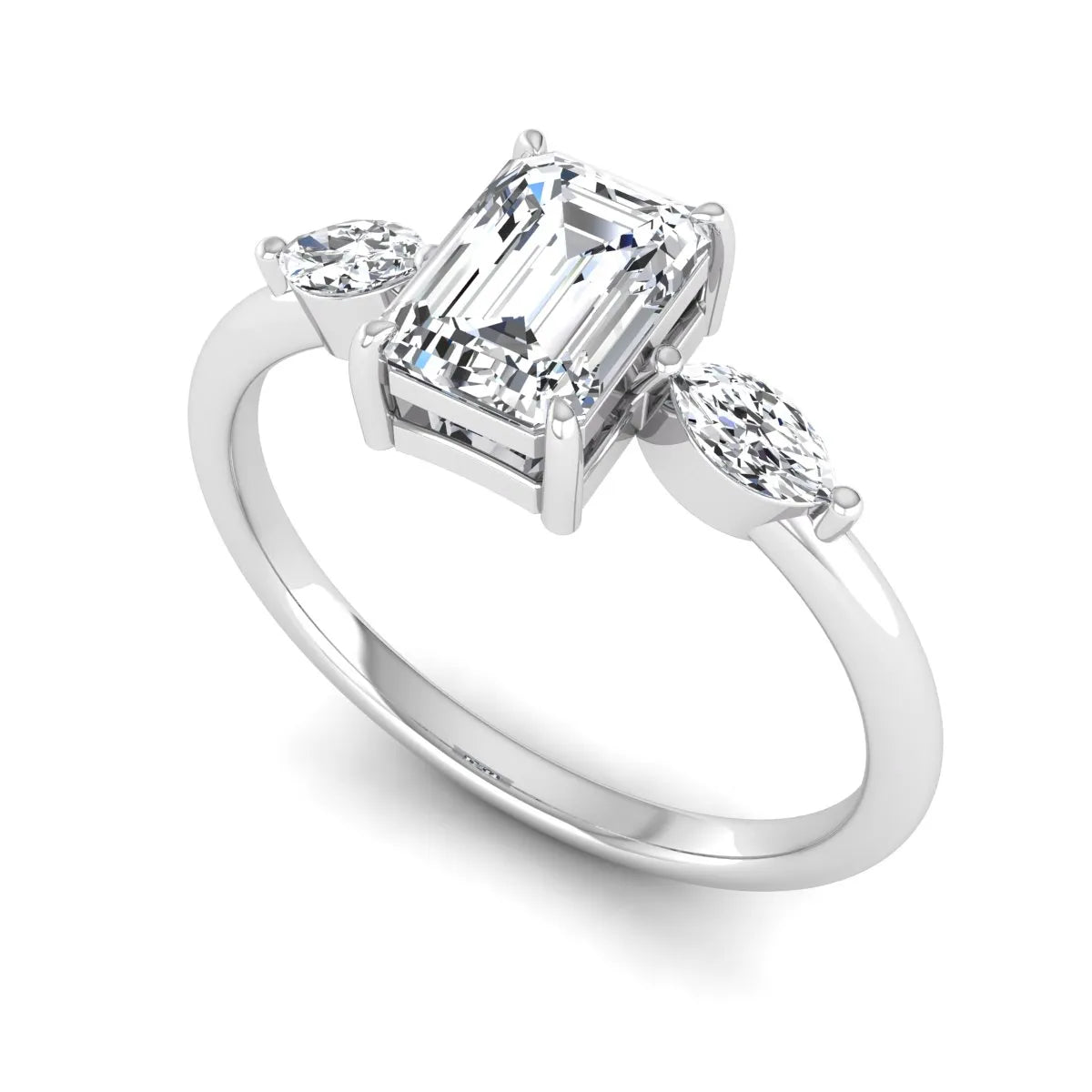 Emerald cut three stone lab grown diamond engagement ring featuring a 1.06 carat IGI certified center diamond with marquise side diamonds in white gold.