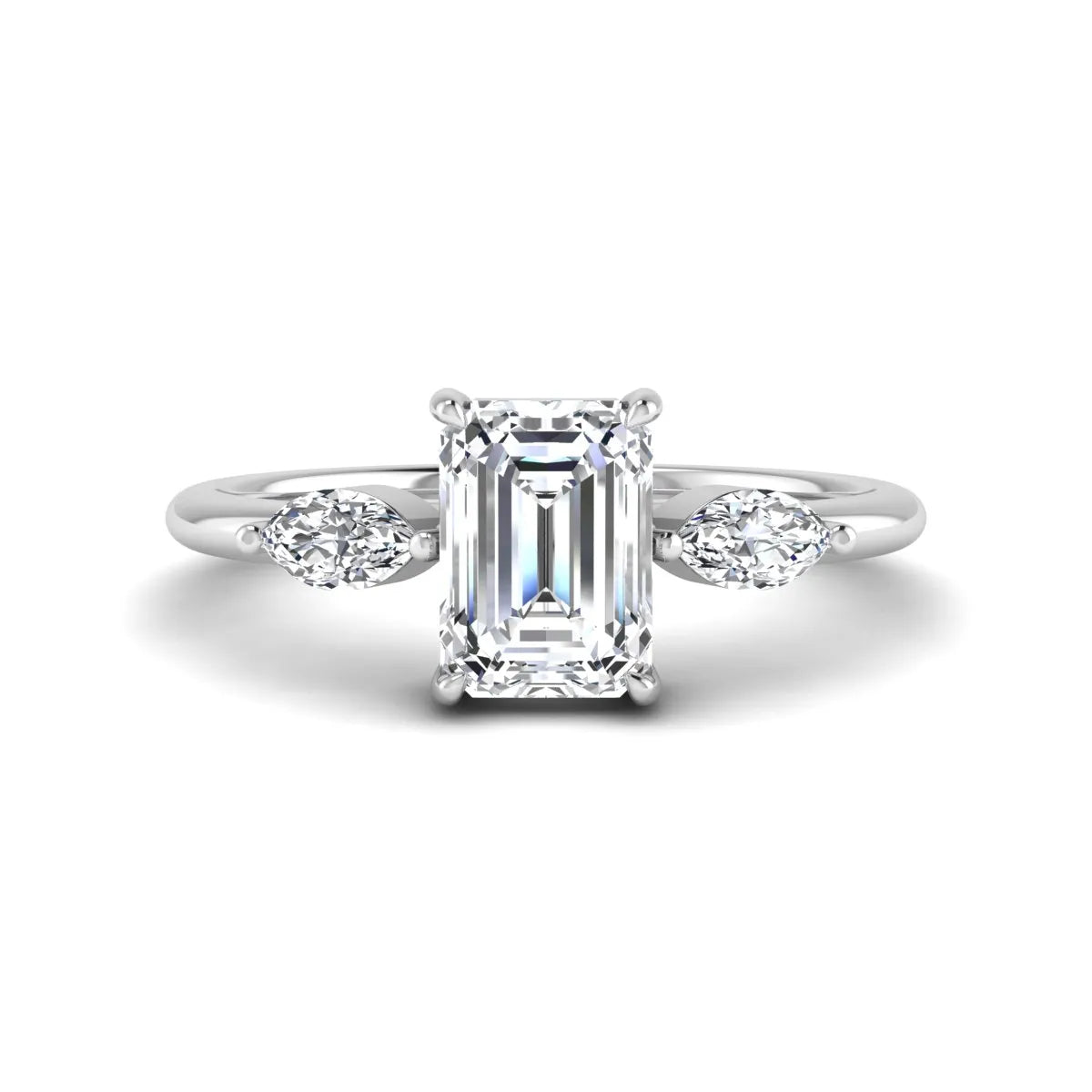 Emerald cut three stone lab grown diamond engagement ring featuring a 1.06 carat IGI certified center diamond with marquise side diamonds in white gold.