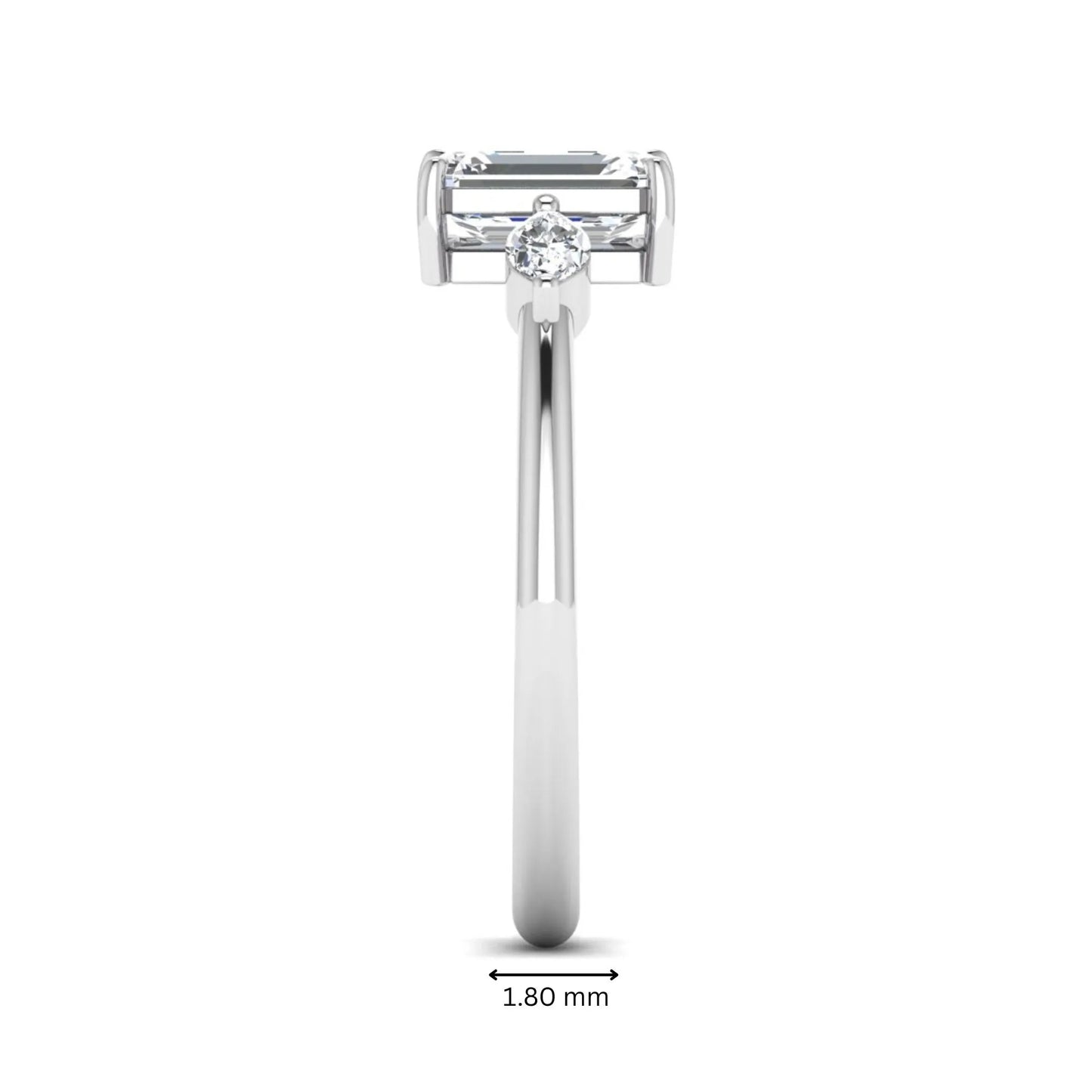 Emerald cut three stone lab grown diamond engagement ring featuring a 1.06 carat IGI certified center diamond with marquise side diamonds in white gold.