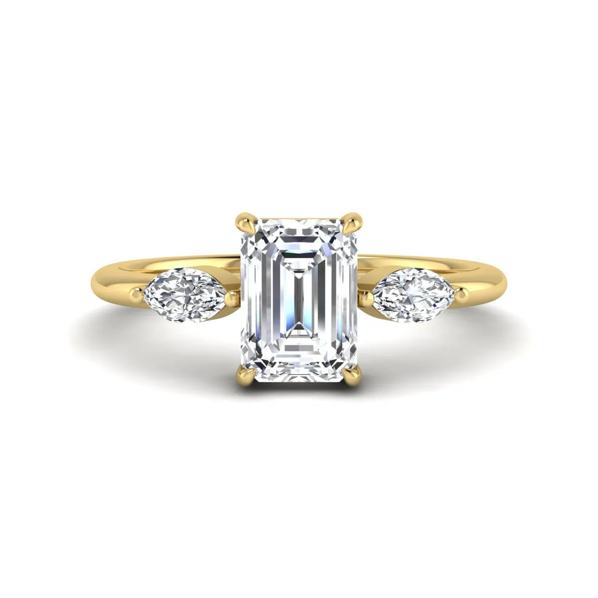 Emerald cut three stone lab grown diamond engagement ring featuring a 1.06 carat IGI certified center diamond with marquise side diamonds in yellow gold.