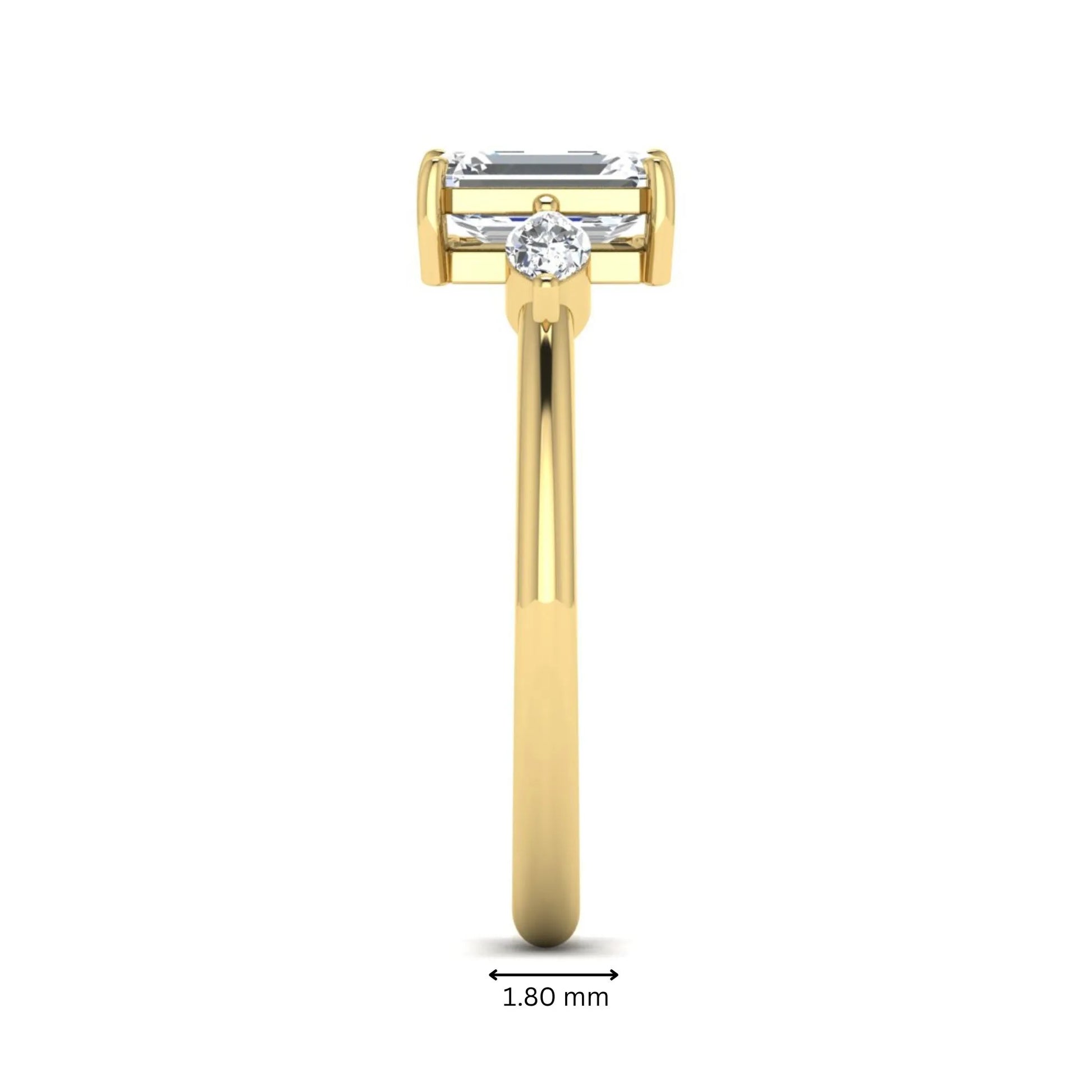 Emerald cut three stone lab grown diamond engagement ring featuring a 1.06 carat IGI certified center diamond with marquise side diamonds in yellow gold.