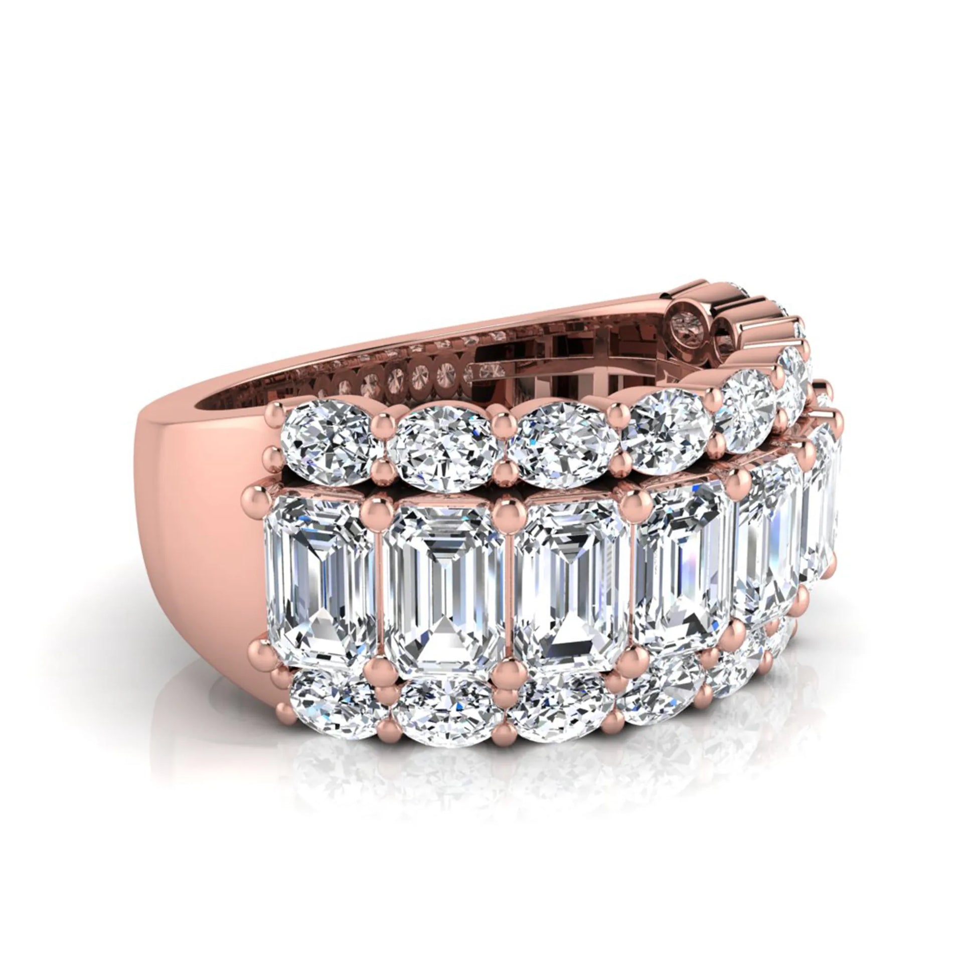 Emerald and oval cut lab grown diamond wide band ring featuring shared prong setting in rose gold design