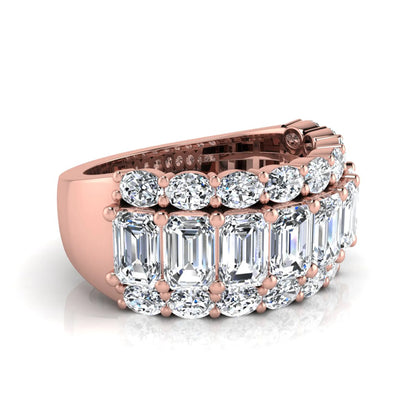 Emerald and oval cut lab grown diamond wide band ring featuring shared prong setting in rose gold design