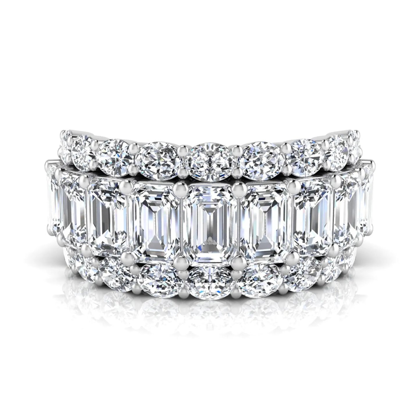 Emerald and oval cut lab grown diamond wide band ring featuring shared prong setting in white gold design