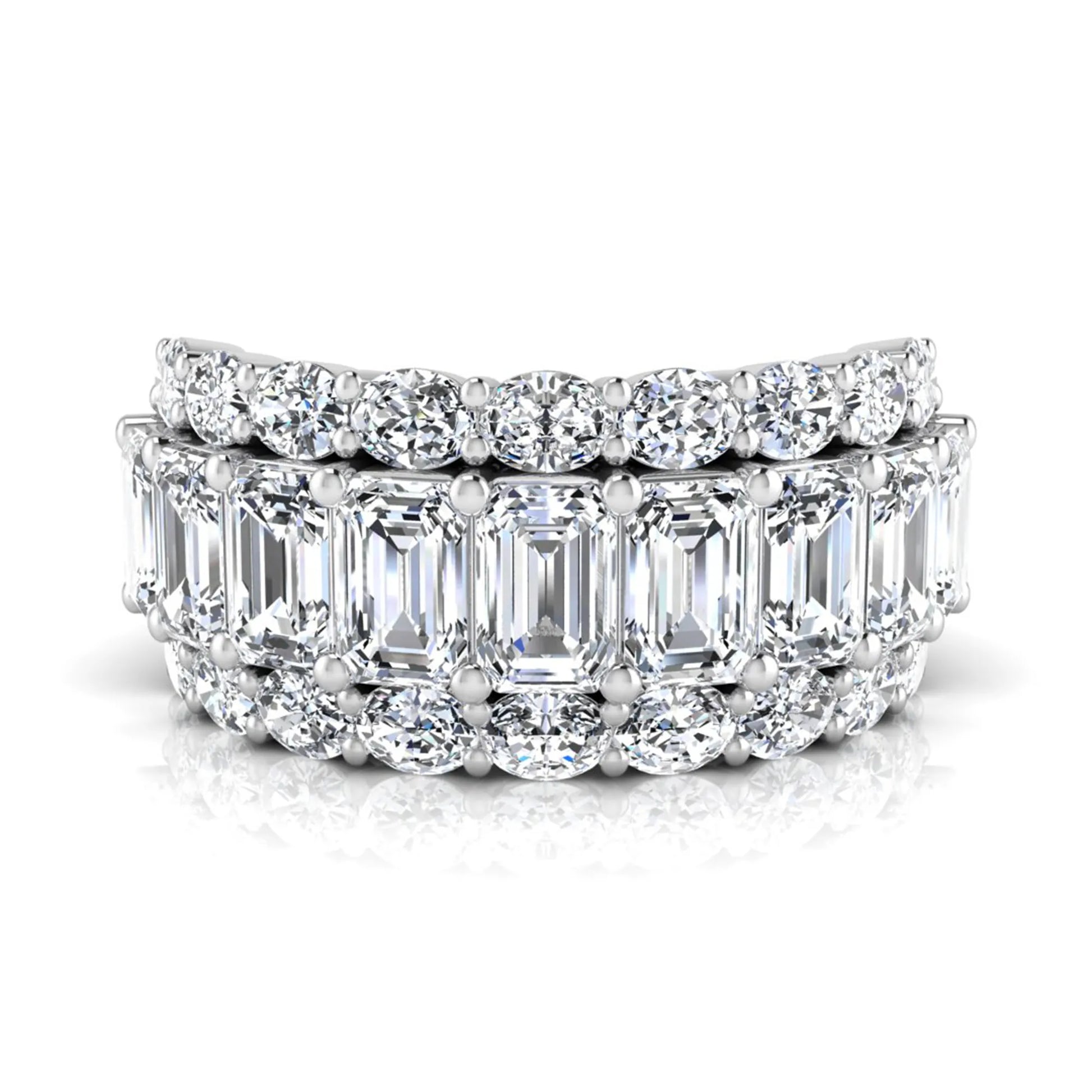 Emerald and oval cut lab grown diamond wide band ring featuring shared prong setting in white gold design