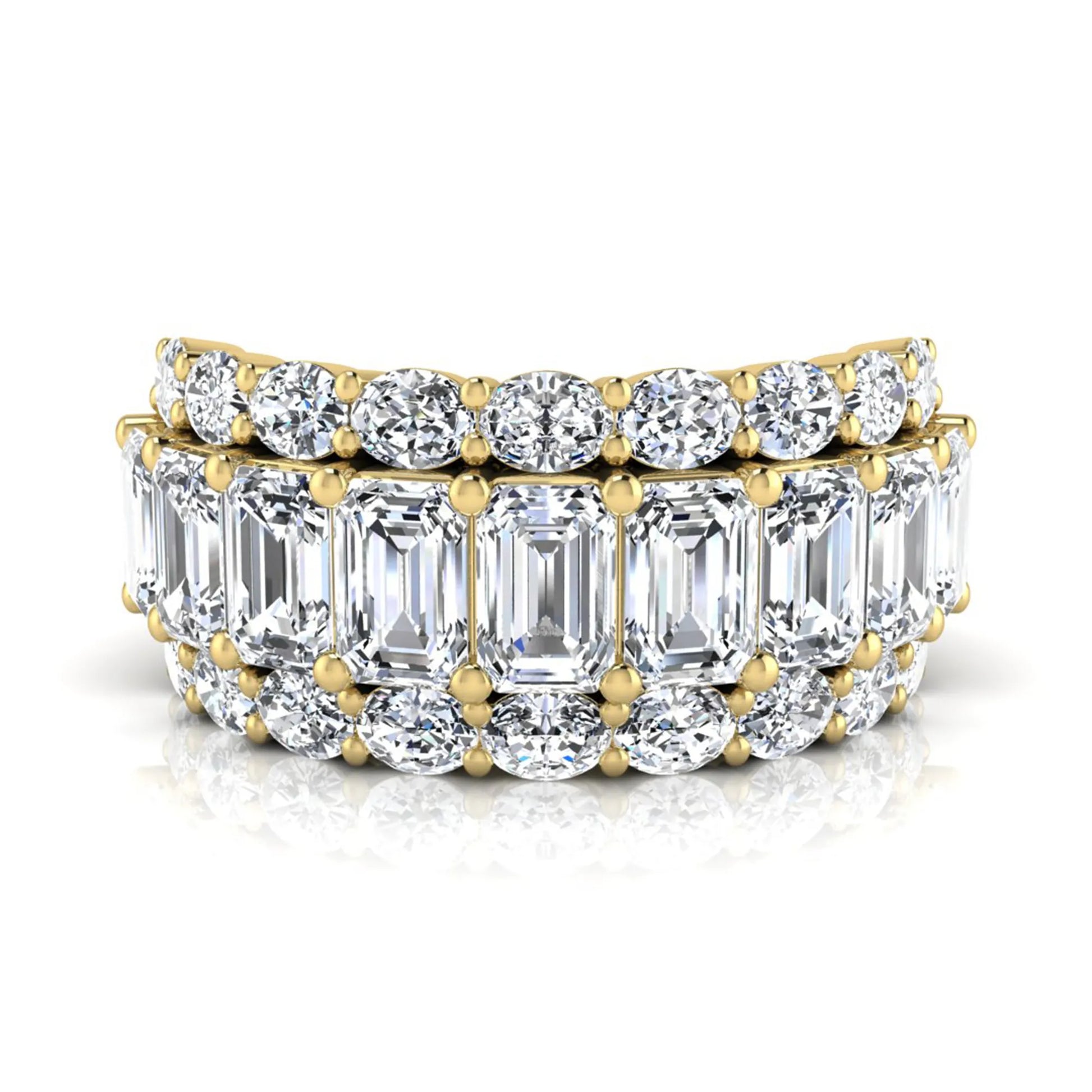 Emerald and oval cut lab grown diamond wide band ring featuring shared prong setting in yellow gold design