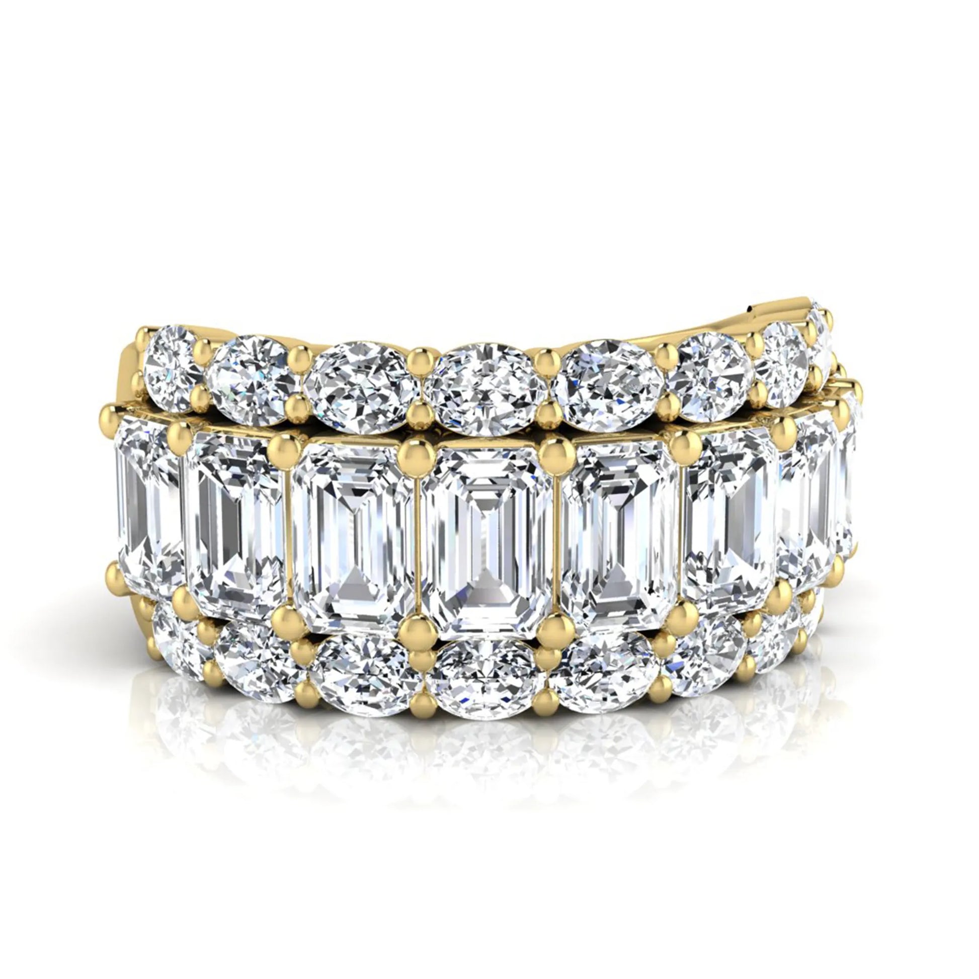 Emerald and oval cut lab grown diamond wide band ring featuring shared prong setting in yellow gold design