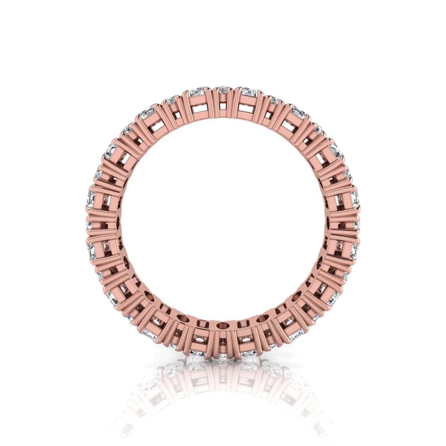 Emerald and oval cut lab grown diamond eternity band ring with alternating diamonds in a shared prong setting and rose gold style.