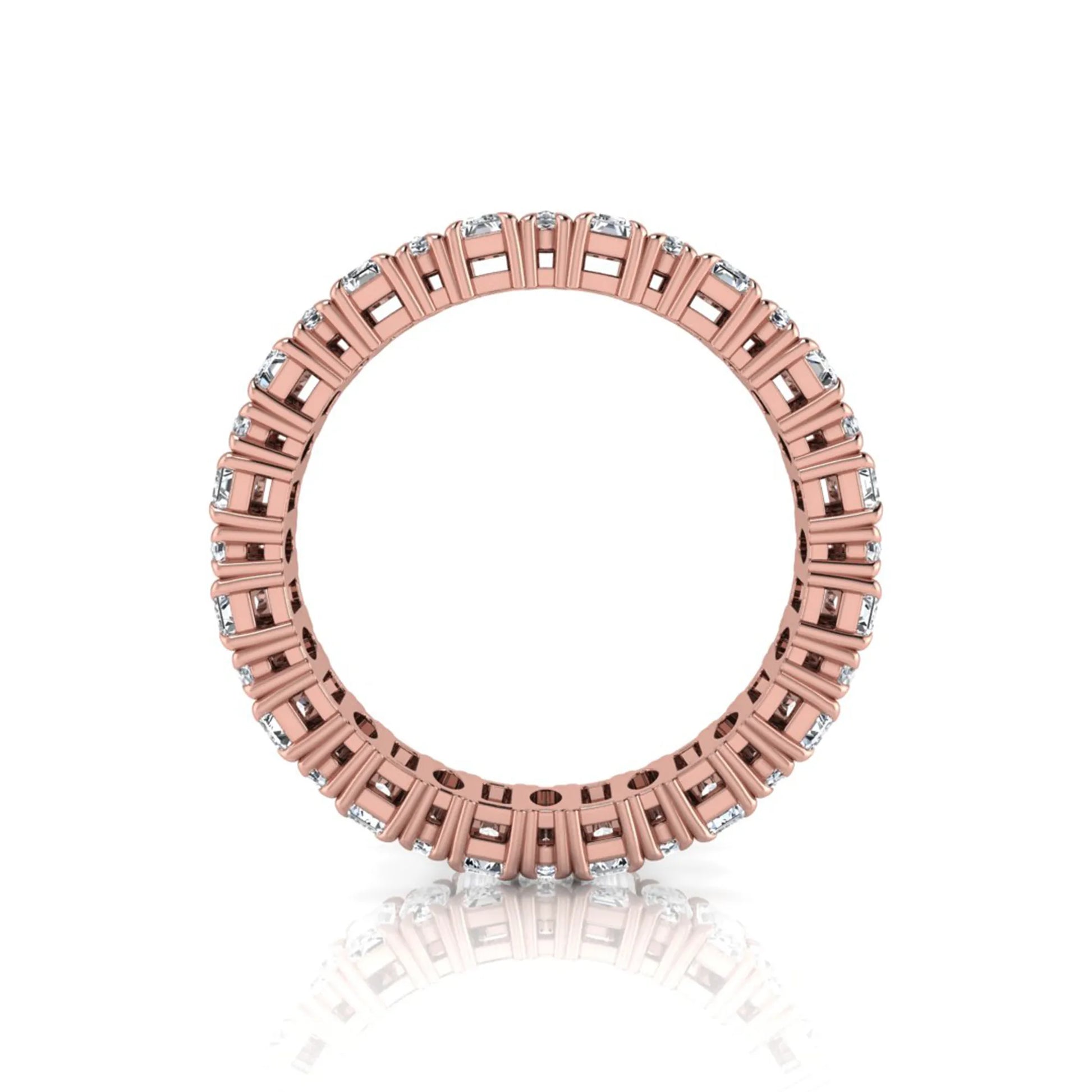 Emerald and oval cut lab grown diamond eternity band ring with alternating diamonds in a shared prong setting and rose gold style.