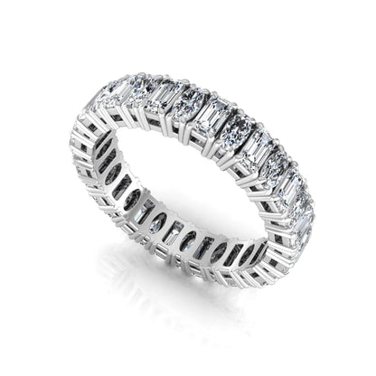 Emerald and oval cut lab grown diamond eternity band ring with alternating diamonds in a shared prong setting and white gold style.