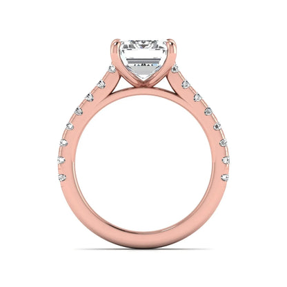Emerald cut lab grown diamond engagement ring with pavé round diamonds in a rose gold four-prong cathedral setting