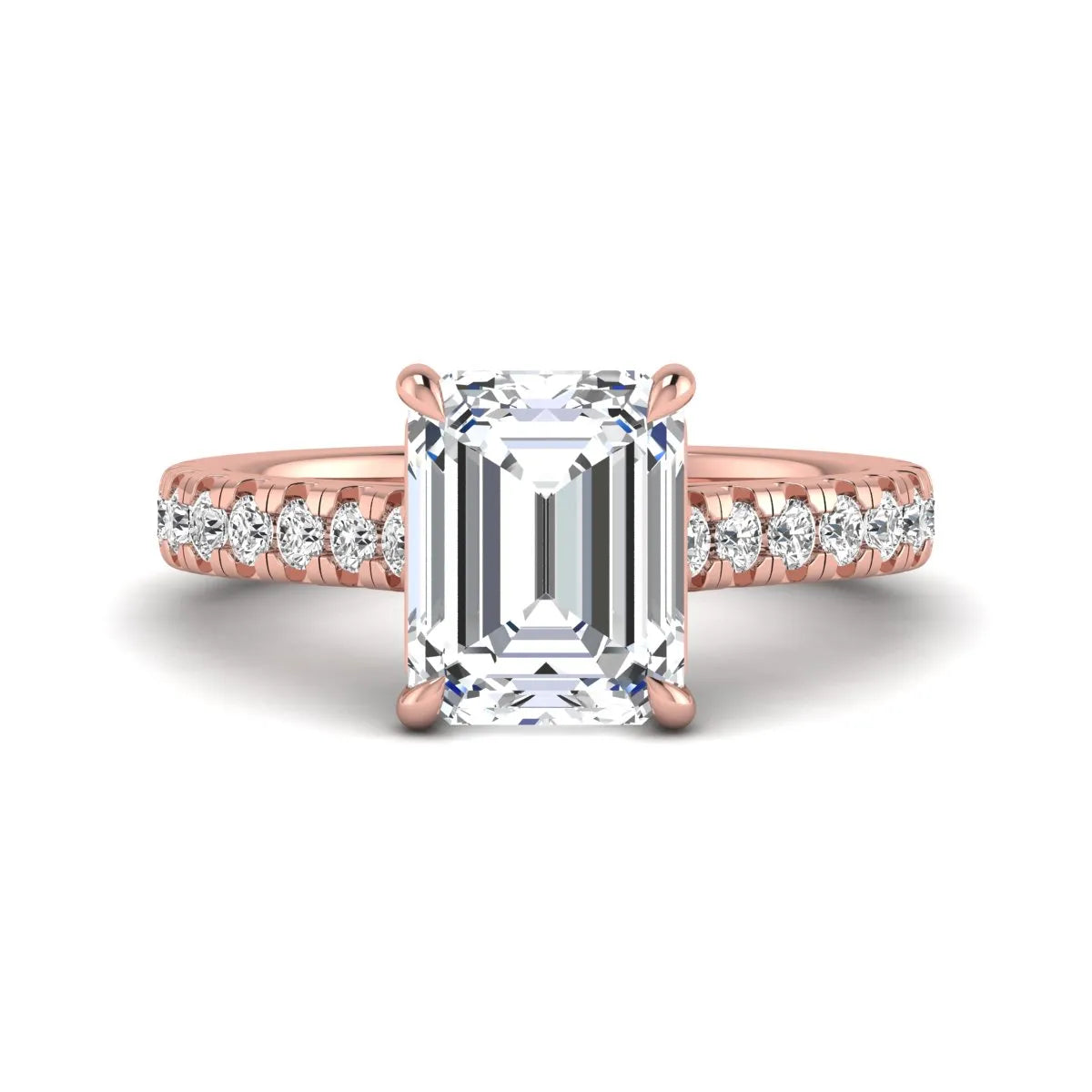 Emerald cut lab grown diamond engagement ring with pavé round diamonds in a rose gold four-prong cathedral setting