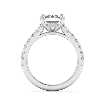 Emerald cut lab grown diamond engagement ring with pavé round diamonds in a white gold four-prong cathedral setting