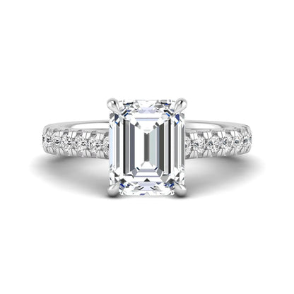 Emerald cut lab grown diamond engagement ring with pavé round diamonds in a white gold four-prong cathedral setting