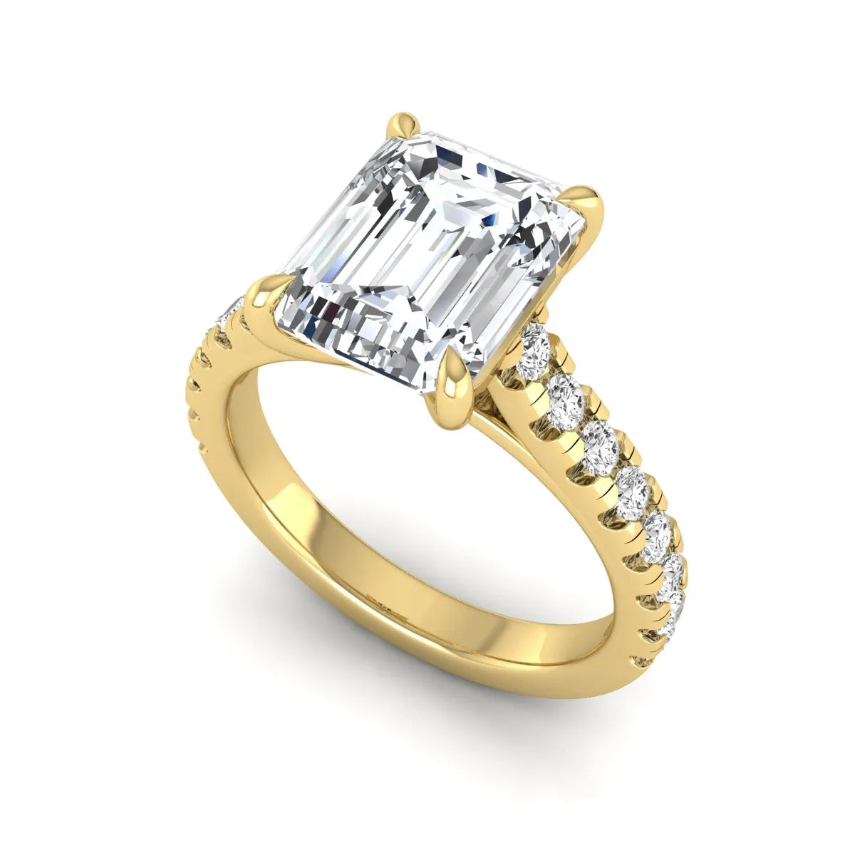 Emerald cut lab grown diamond engagement ring with pavé round diamonds in a yellow gold four-prong cathedral setting