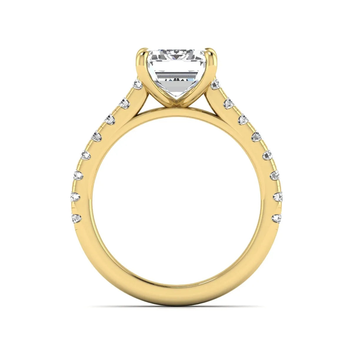 Emerald cut lab grown diamond engagement ring with pavé round diamonds in a yellow gold four-prong cathedral setting