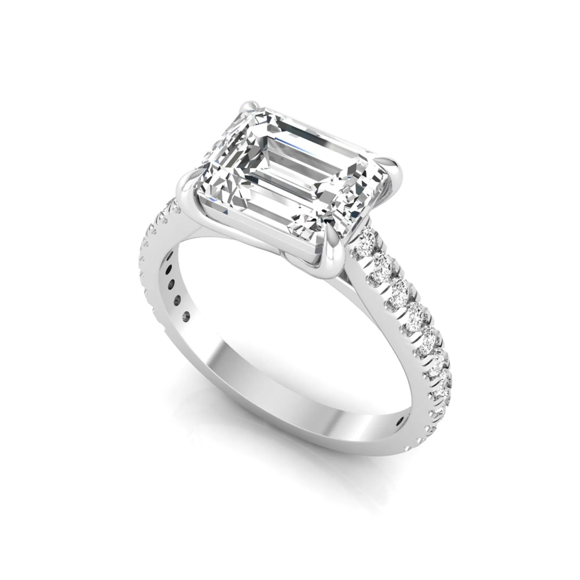 Emerald cut lab grown diamond solitaire engagement ring featuring a four-prong setting with a pavé diamond band in white gold tone.