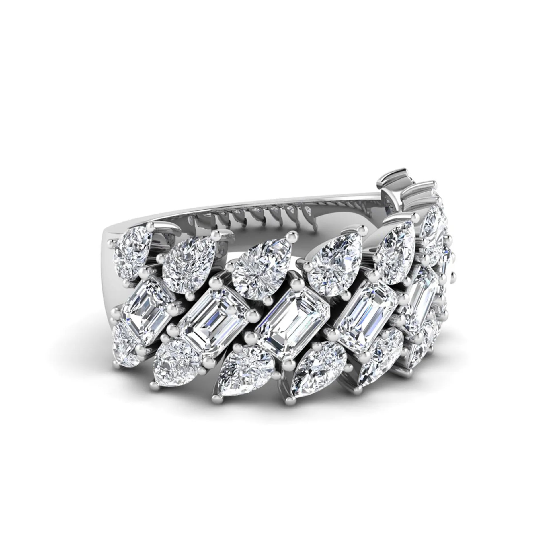 Emerald and pear cut lab grown diamond cluster ring with prong setting in white gold tone wide band design.