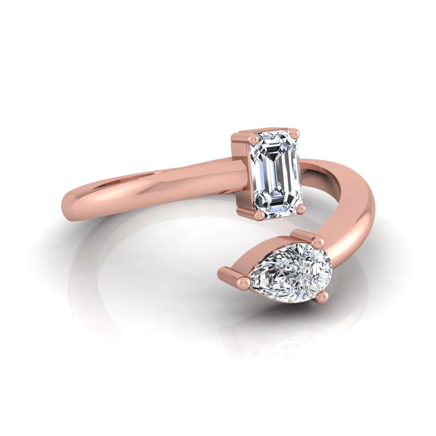 Emerald and pear cut lab grown diamond Toi et Moi ring featuring a minimalist open design in rose gold