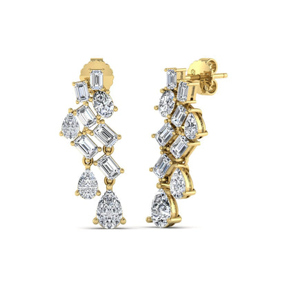 Emerald, pear, and oval cut prong set lab grown diamond drop earrings featuring a cascading multi-shape design in a yellow gold finish with push back closure.