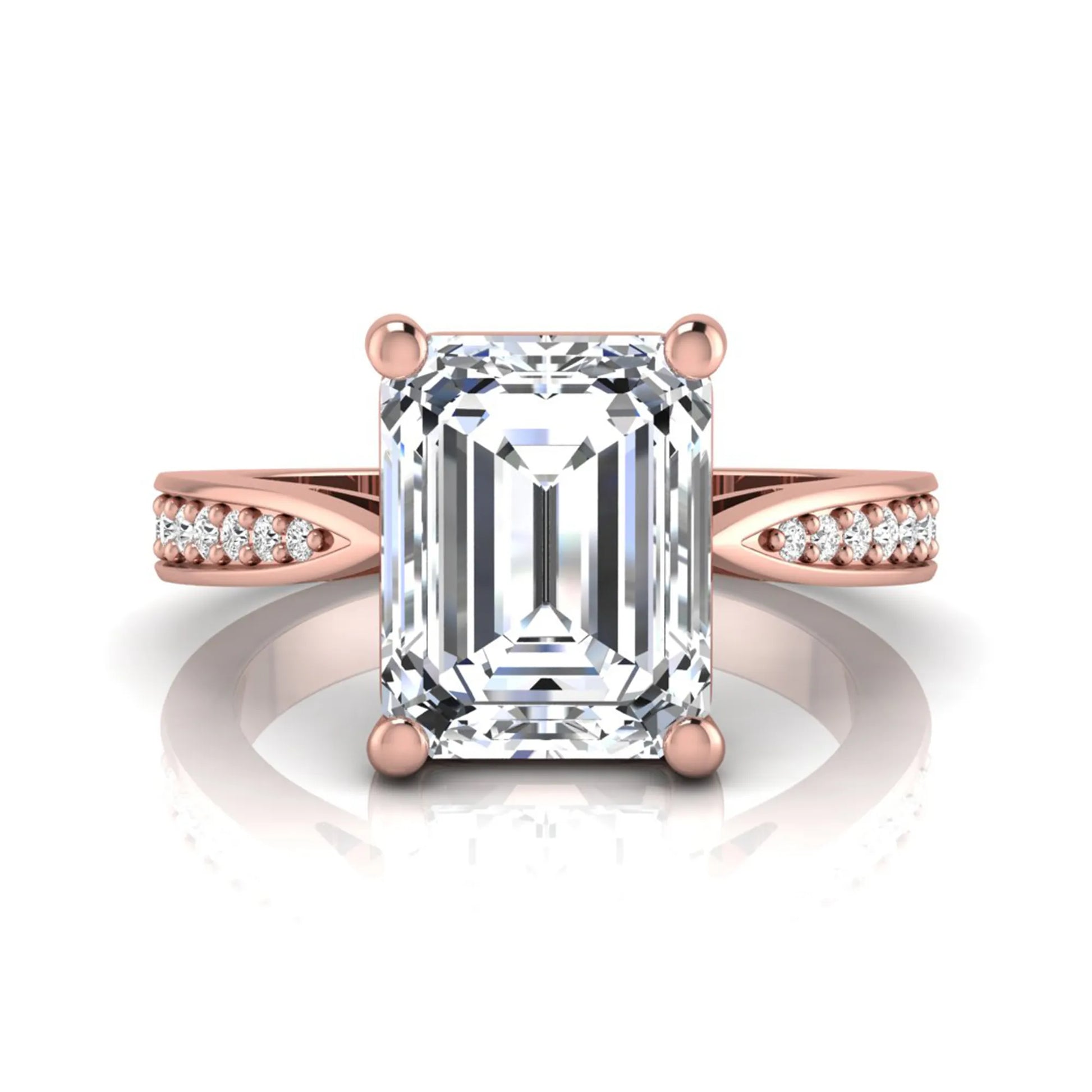 Emerald cut lab grown diamond engagement ring featuring a four-prong setting with round diamond accent band in a rose gold style design.